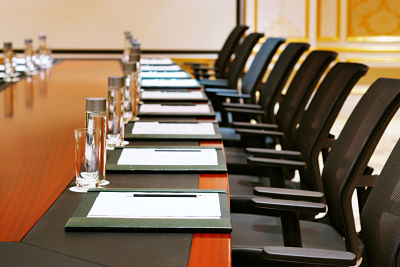 Picture of board room table and chairs.