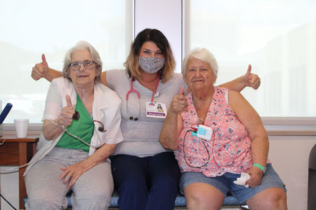 Pictured is our Nurse with 2 patients