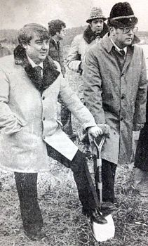 Picture of an old black and white photo of groundbreaking.